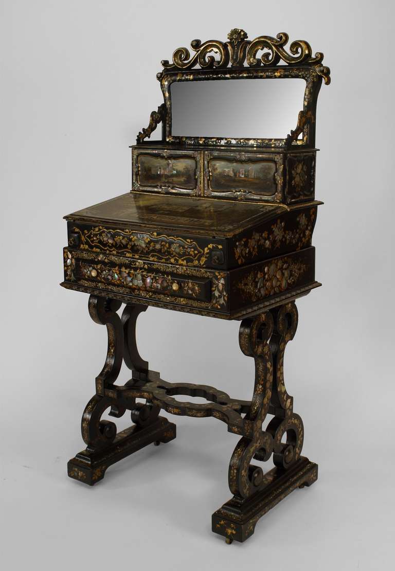 English Victorian (circa 1860) black lacquered & decorated pearl inlaid papier mache ladies' bureau/work table with filigree pediment and hidden gaming board. (3 sections)
