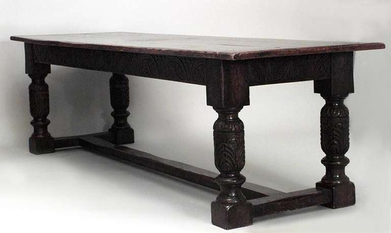Italian Renaissance style (19/20th Century) large oak refectory table with carved apron and legs with trestle base.
