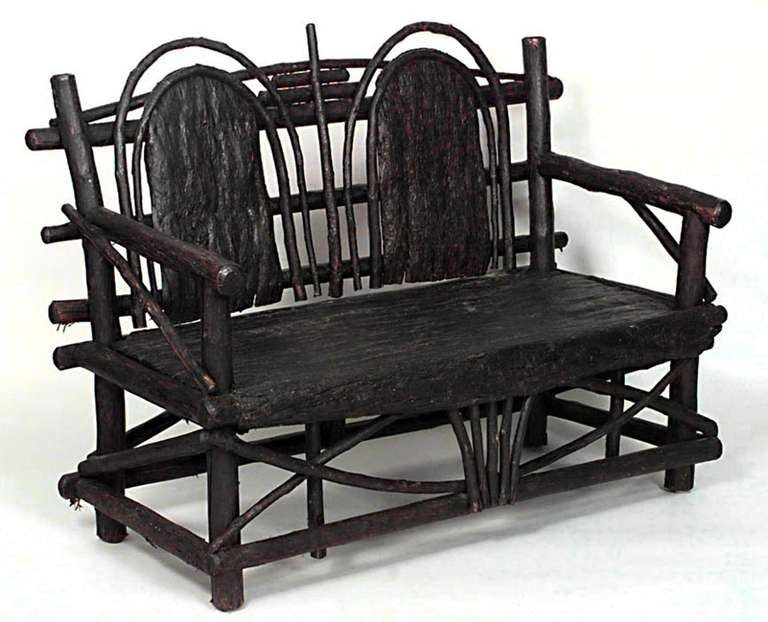 American Rustic Adirondack loveseat of bent willow, twig & root construction with double arched barked splat back & seat (19th Cent)
