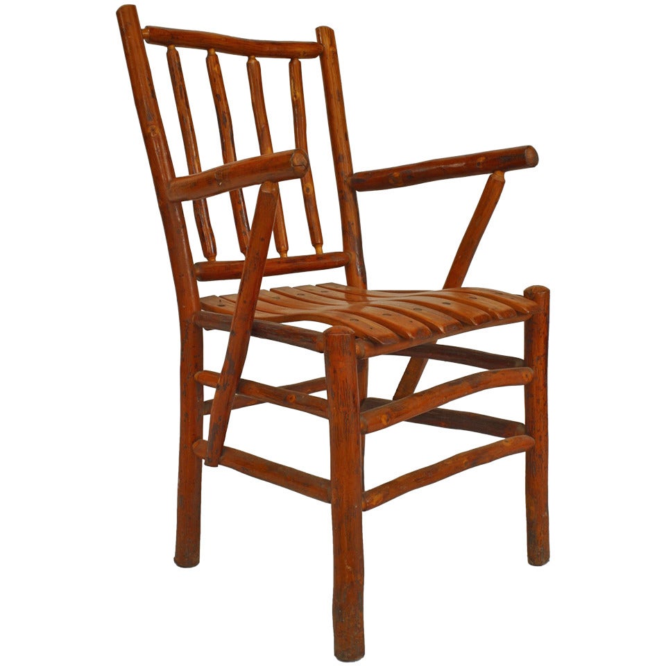 Set of 12 American Rustic Old Hickory chairs with 4 spindle back & contoured slat design seat and box form stretcher (2 arms/10 sides-1 branded Martinsville)(side: 19