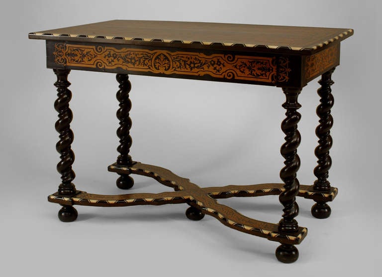 Renaissance Revival ebonized center table with a bone trim and marquetry inlaid floral and scroll design top resting above a drawer, swirl legs, and an x-form stretcher.