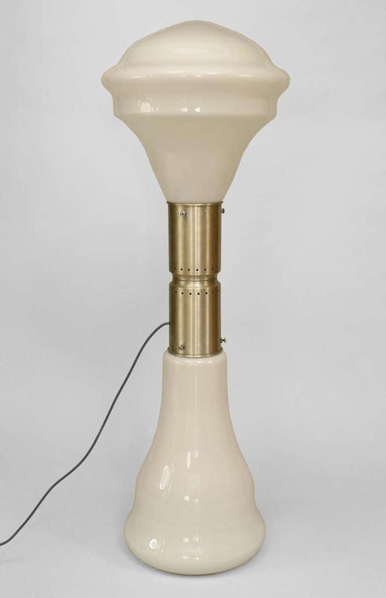 Italian Post-War Design (1960s) floor lamp with 2 white glass sections separated by an aluminum center post.

