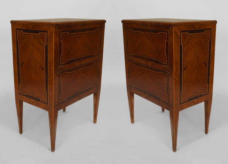 Pair of Italian Neoclassic rectangular bedside commodes, each composed of walnut and featuring four tapered square legs and inlaid banded and geometric designs visible at the tops and sides. One commode features one door, and the other two