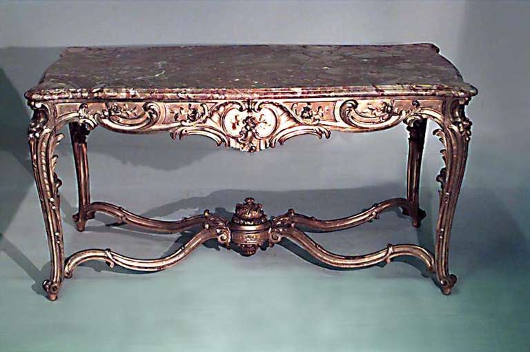 French Regence style (19th Century) gilt rectangular center table with yellow shaped marble top and stretcher.

