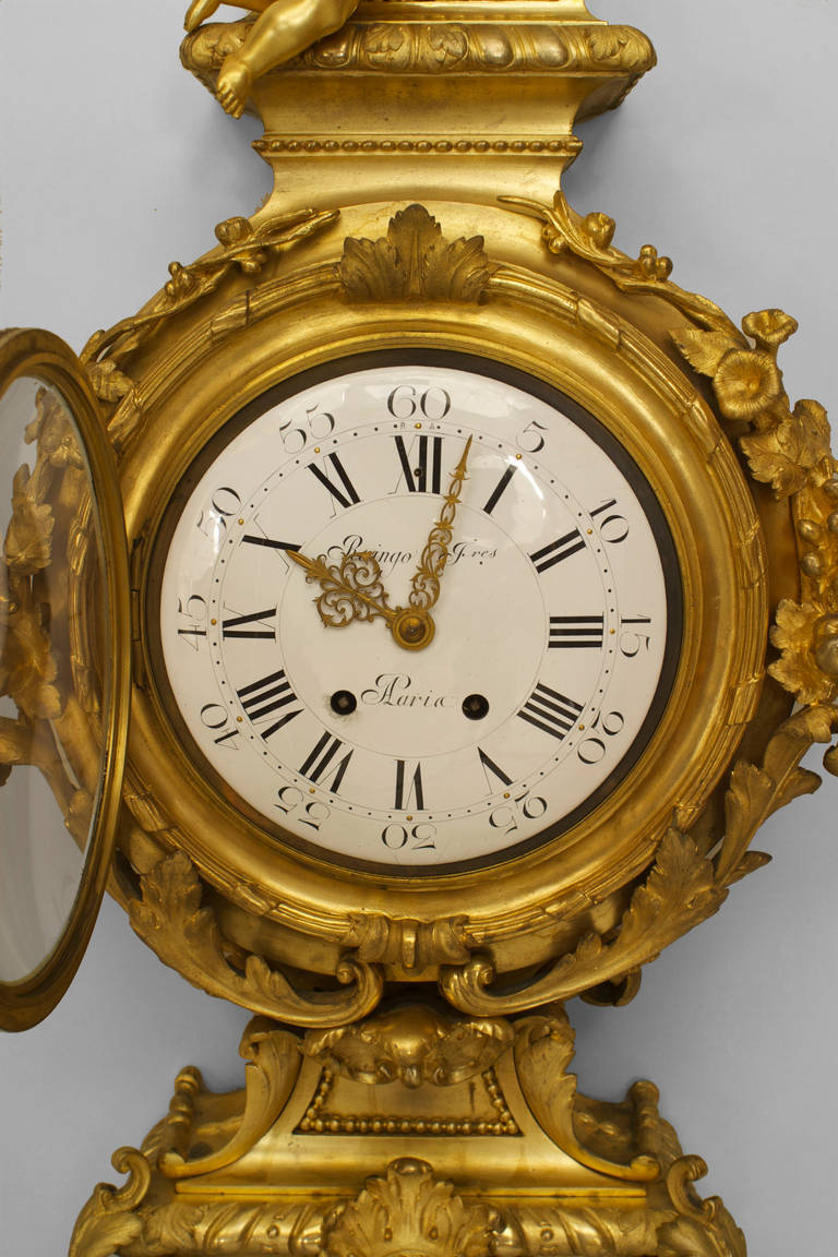 Paar Louis XVI-Goldbronze-Wanduhren und Barometer (Louis XVI.) im Angebot