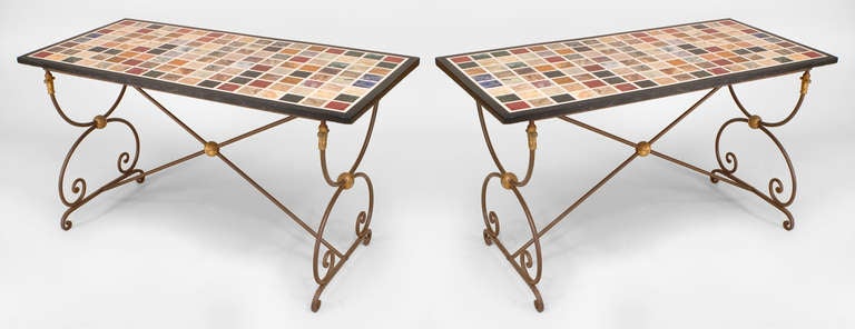 Pair of Italian Neo-classic-style (19/20th Century) steel rectangular end tables with double scroll design sides and 