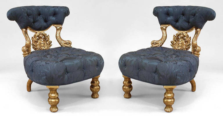 Pair of Italian Venetian style (19th Cent) silver gilt dolphin side chairs with carved back and blue tufted upholstery
