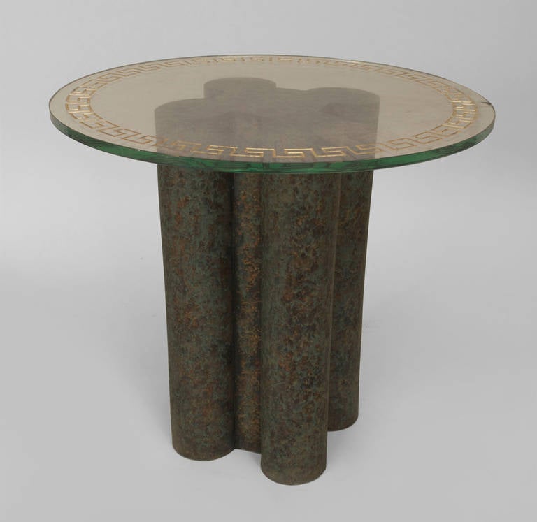 American Post-War Design low end table with a verdigris green marbleized terra cotta clover leaf shaped base supporting a round glass top secured with a brass center.
