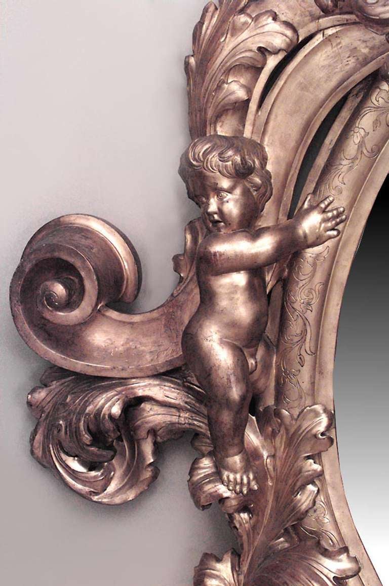 French Victorian Monumental Carved Giltwood Cupid Design Wall Mirror In Good Condition For Sale In New York, NY