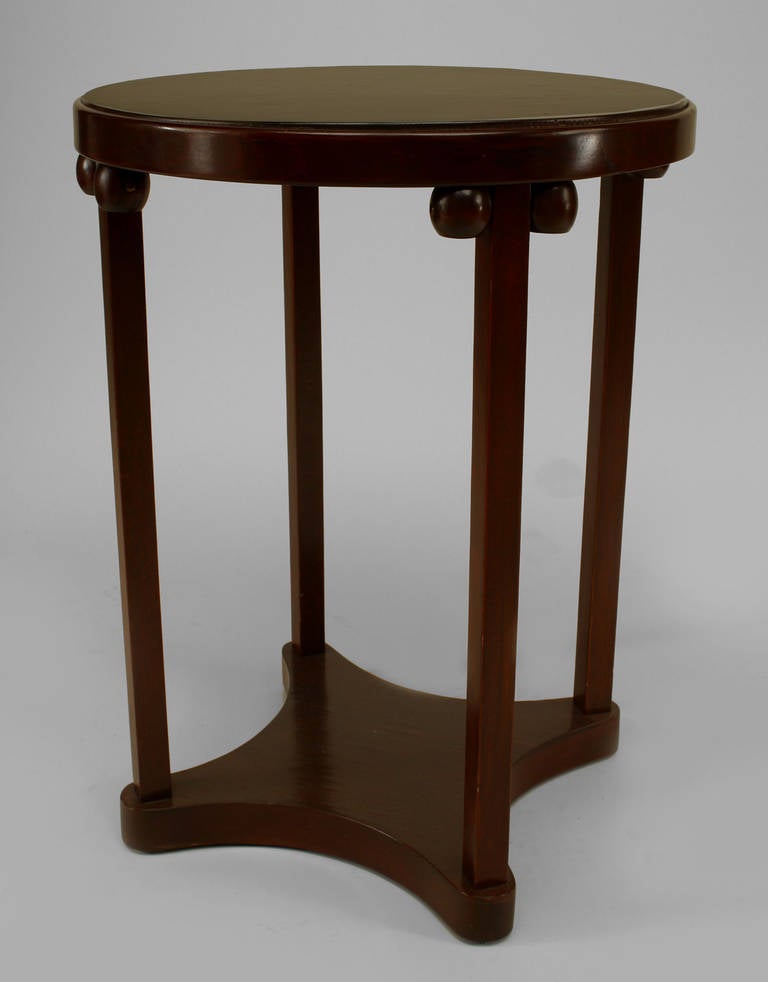Austrian Bentwood Secessionist stained beechwood end table with a round platform base and top supported with balls on either side of 4 square legs.
