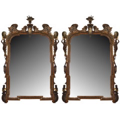 Paire de miroirs muraux italiens en bois de rose sculpté de style néo-rococo