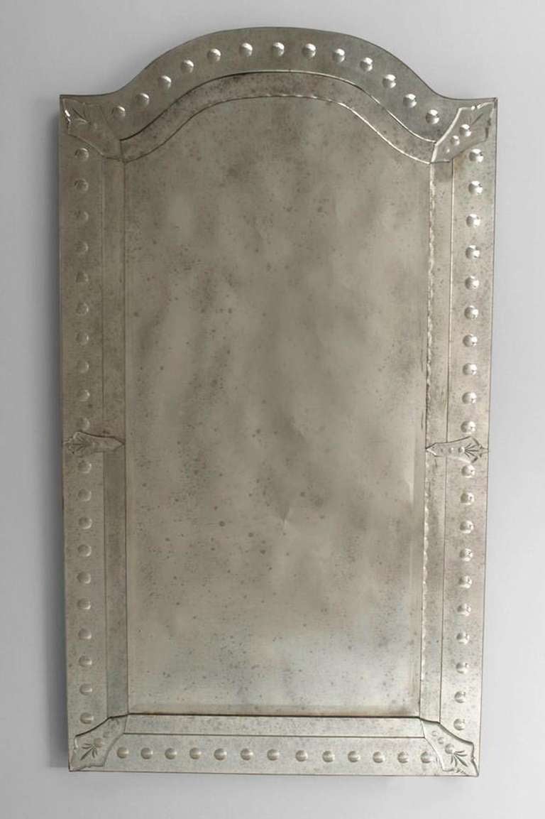 Two Murano glass mirrors with vertical rectangular forms and arched tops set within frames of applied glass etched with dot designs (modern).

PRICED EACH.