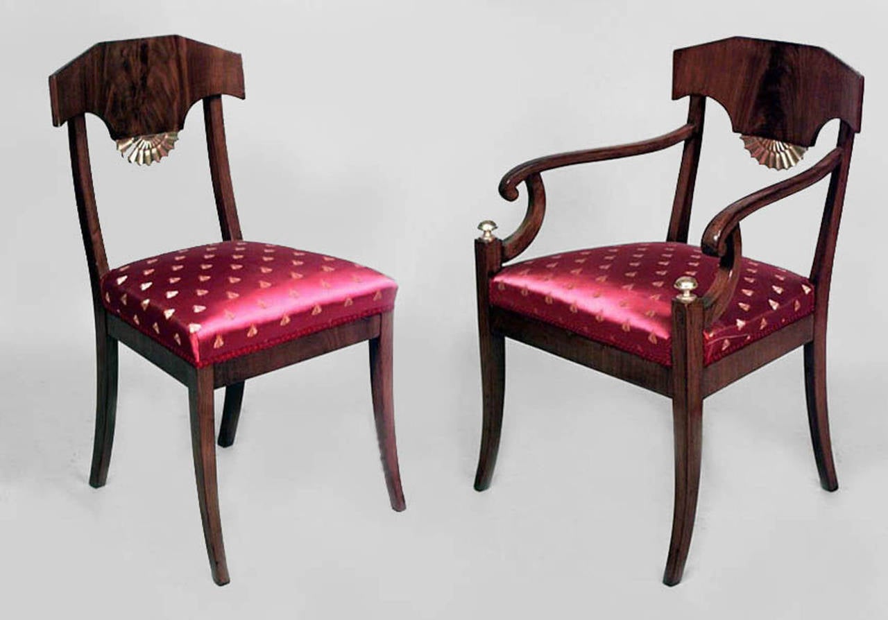 Set of eight Russian Neoclassic parcel gilt and mahogany dining chairs with red silk upholstered seats. 

(1st ½ 19th Cent, 2 arm chairs: 23