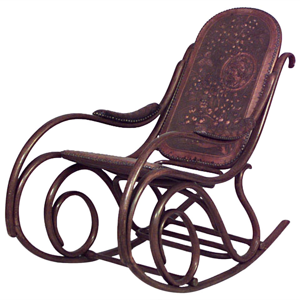 Austrian Bentwood (19th Cent) scroll design rocking chair with embossed leather upholstery. (THONET, Wien)
