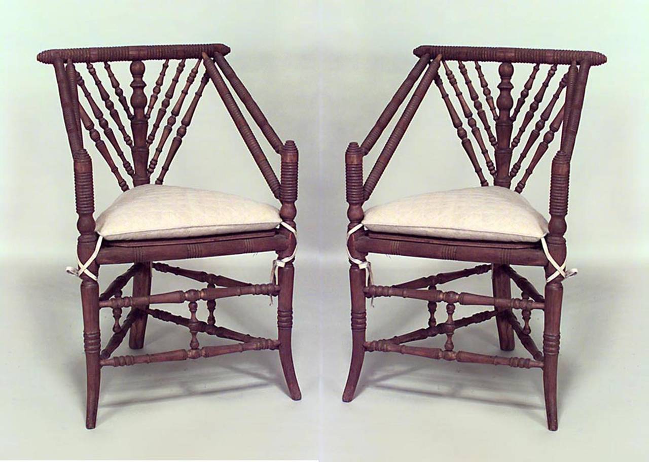 Pair of English Charles II style oak and ash 'turner's' chairs with triangular seat on 3 legs joined by stretchers. (19th Century)
