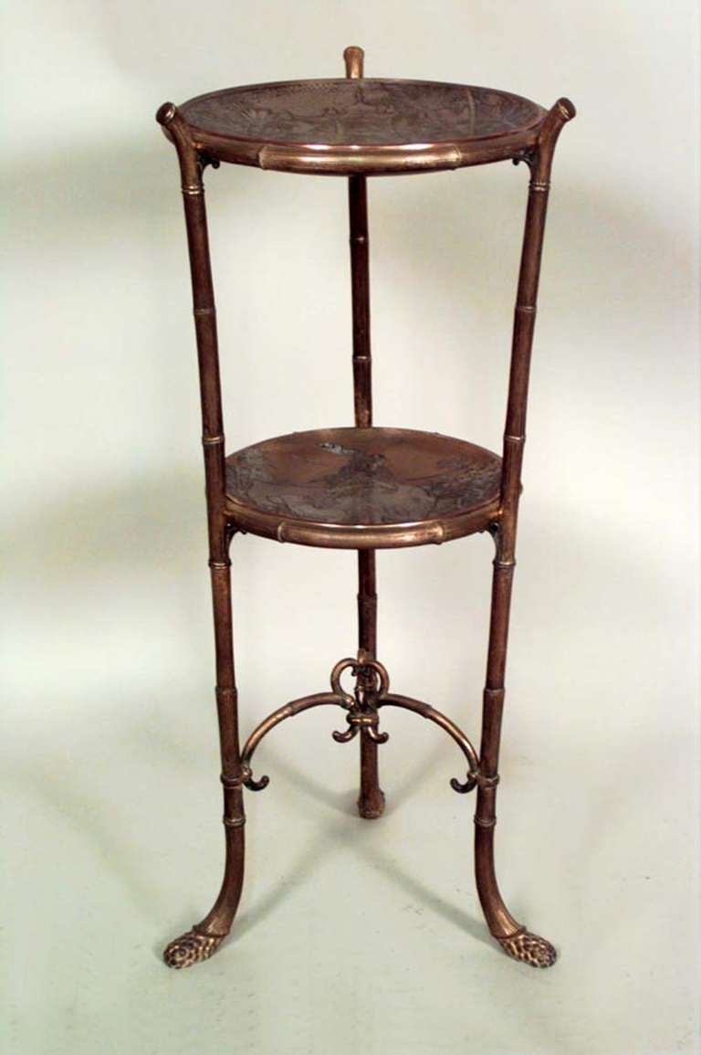 English Regency style (19th Century) bronze and silver plate three-tier table with etched bowl shelves and three faux bamboo legs.
