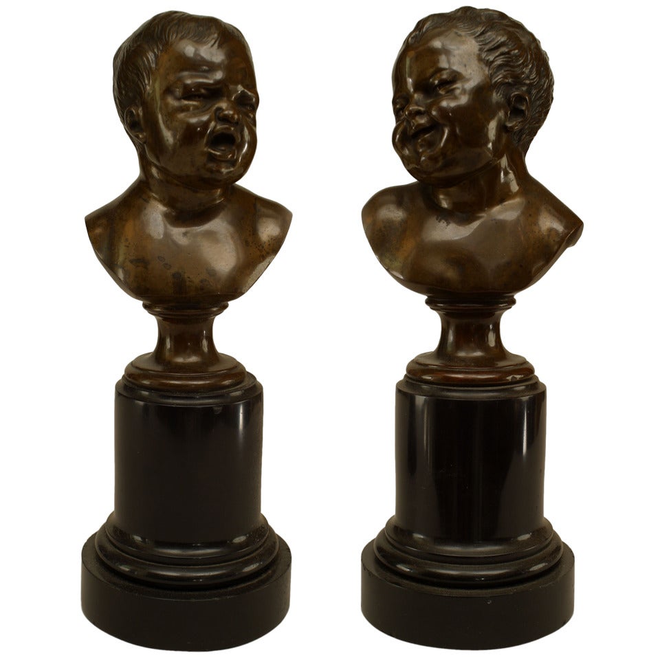 Pareja de bustos victorianos de bronce de bebés llorando