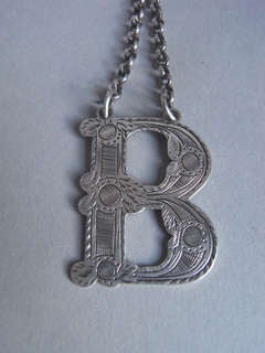 Antique A fine Wine Label modelled as the letter B made circa 1870 by J. Neville of Glasgow