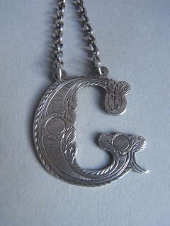 Antique A fine Wine Label modelled as the letter C made circa 1870 by J. Neville of Glasgow