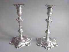 A fine pair of George II cast Candlesticks made in London in 1750 by Simon Jouet.
