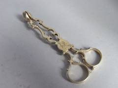 Antique A fine pair of Silver Gilt Sugar Nips made by Henry Plumpton.