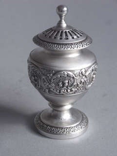 An unusual George III Pepper Caster made in London in 1817 by Emes & Barnard.