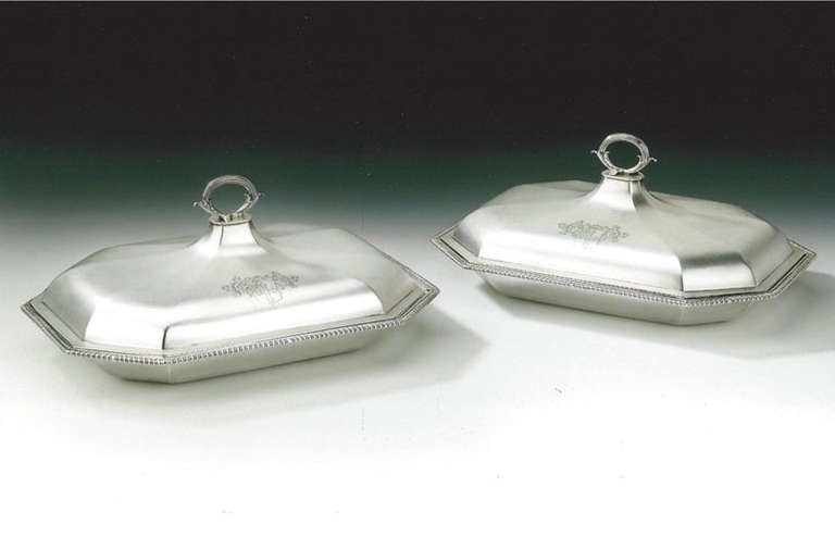 An exceptional & unusual pair of George III Vegetable Dishes made in London in 1794 by Robert II & Thomas II Makepeace.

The Entree Dishes are of the unusual Pagoda form with a broad rectangular base, with cut corners and a gadrooned rim. The