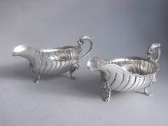 A very rare & unusual pair of George III Cream Boats made by James England.