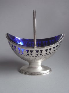 Antique A fine George III Cream Basket made in London in 1786 by Robert Hennell.