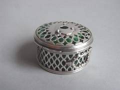 A George III Pierced Bougie Box made by William & Aaron Lestourgeon.