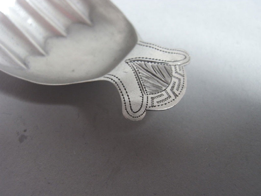 A rare George III Hand Caddy Spoon made in Birmingham in 1806 by Joseph Taylor.