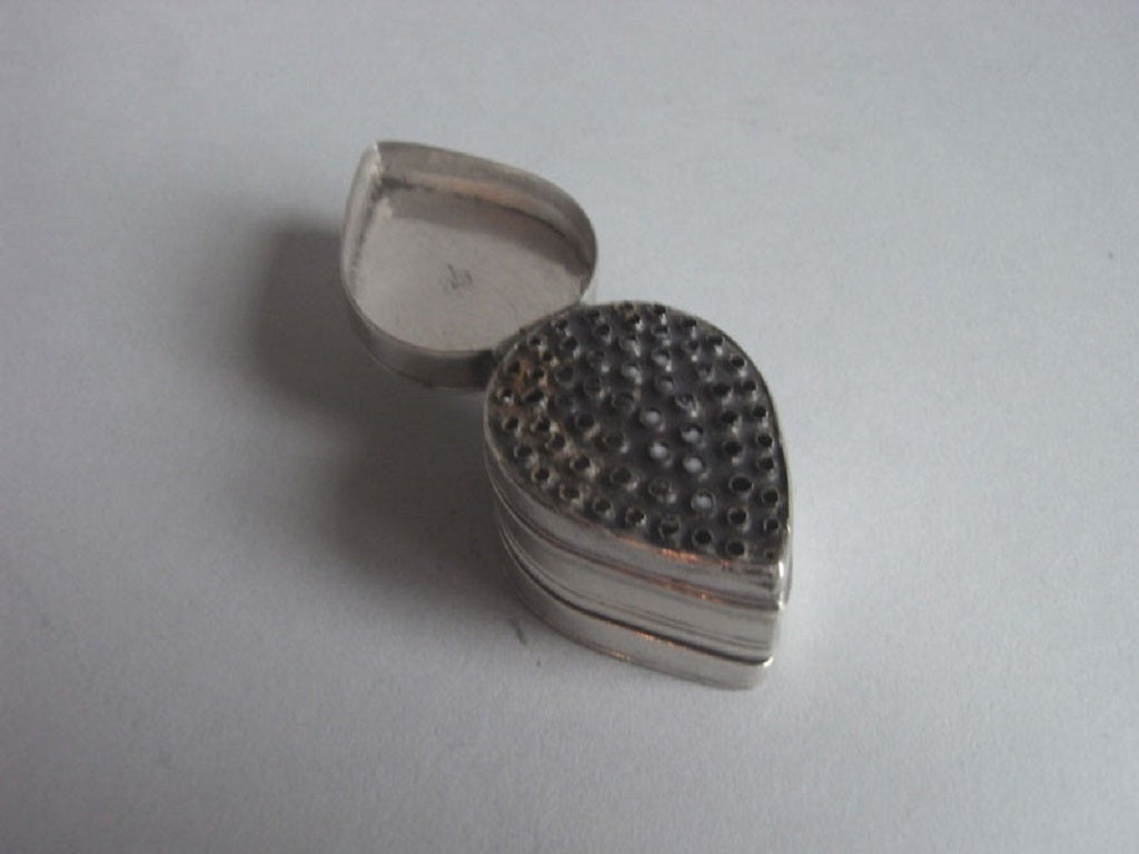 English A George I Teardrop Nutmeg Grater made in London circa 1725 by Thomas Kendrick.