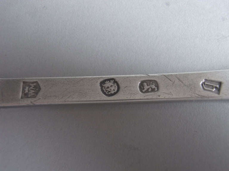This very fine Trefid Spoon has a plain rat tail on the reverse of the bowl. The top of the stem is engraved with contemporary initials engraved in unusual script lettering. The spoon is of an exceptional gauge, quality and colour and is very well