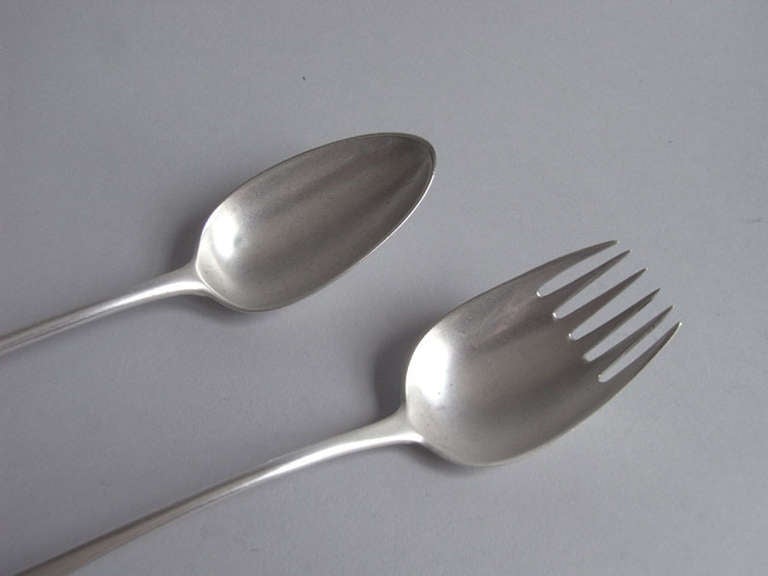 A pair of George III Old English Pattern Salad Servers made in London in 1790
