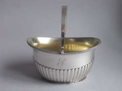 An unusual George III Sugar Basket made in London in 1799 by Richard Cooke.