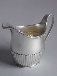 A very fine George III Milk Jug made in London in 1799 by Richard Cooke.