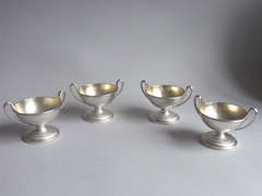 An exceptionally fine set of four George III Classical Salt Cellars