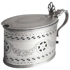 Antique A George III Mustard Pot made in London in 1785 by Robert Hennell.