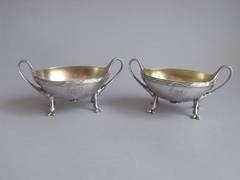 A pair of cast George III Neo-Classical Salt Dishes