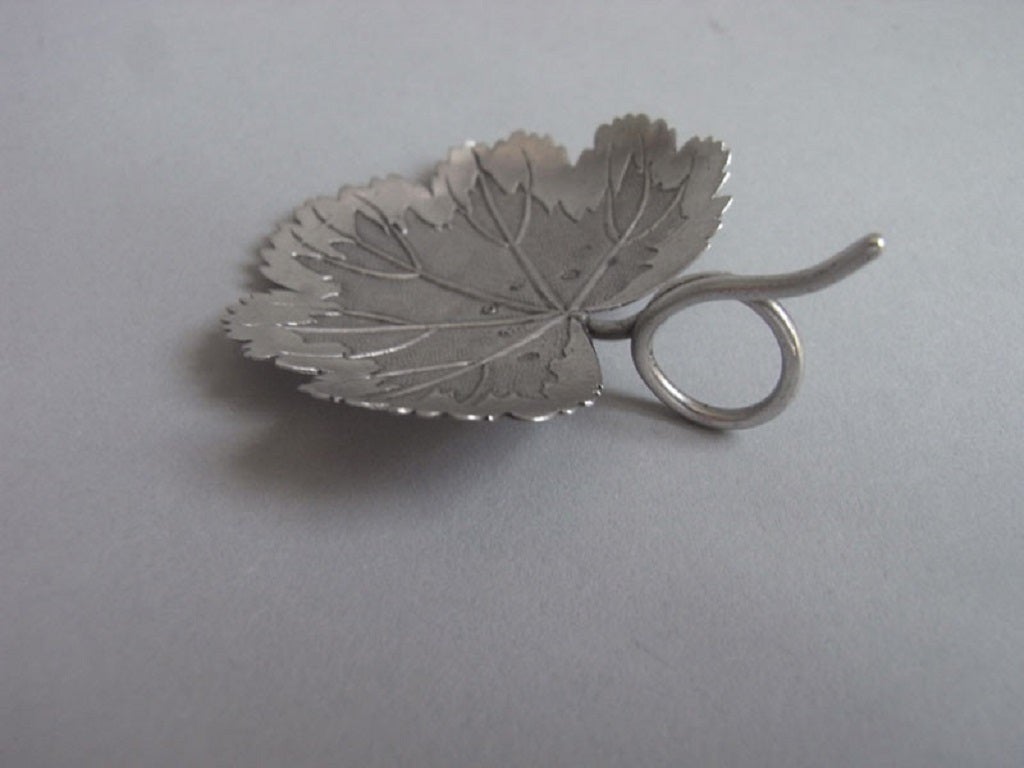 A Linwood "Strawberry Leaf" Caddy Spoon made by Matthew Linwood.