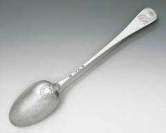 A fine and rare George II "Shell Back" Hash Spoon made by Elias Cachart.