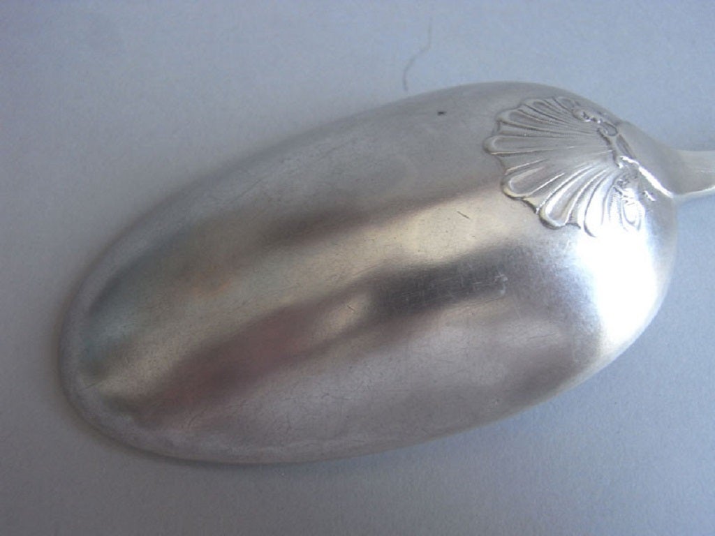 A fine and rare George II "Shell Back" Hash Spoon made by Elias Cachart.