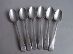 A set of twelve George III Transitional Feather Edge Pattern Teaspoons