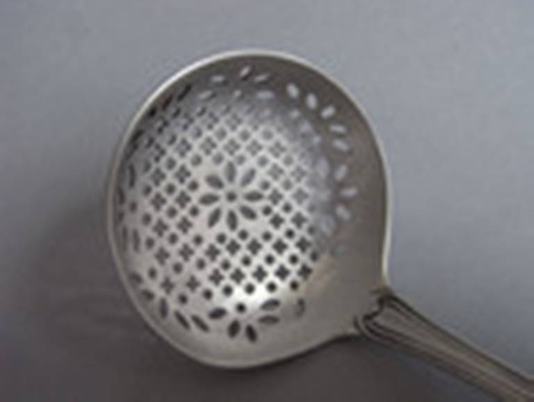 A George III Sifter Spoon made in London in 1790 by Hester Bateman.