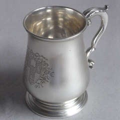 An early george III Mug made in London by Whipham & Wright in 1767