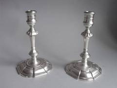 A fine pair of George II cast Candlesticks