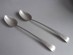 A very fine pair of George III Stuffing Spoons