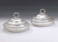A very unusual pair of George III Covered Vegeatble Dishes made in London