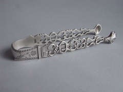 A pair of George III cast Sugar Tongs made in London circa 1770 A pair of George III cast Sugar Tongs made in London circa 1770