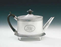 A fine George III Teapot and Stand made in London in 1789 by Henry Chawner